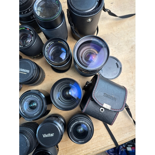 753 - Large Collection of SLR Lenses inc. Canon, Konica, Vivitar, Sigma, Olympus etc.