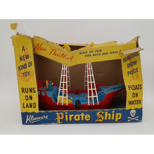 279 - Group of Hong Kong Plastic Toy Buses, Tri-ang Lugsail Dinghy and Kleeware Pirate Ship