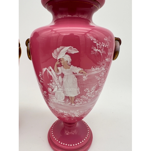 729 - Pair of Victorian Pink Glass Urns & Covers with Mary Gregory Style Enamel Painting - one a/f