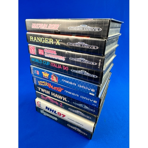 74 - 10 Boxed Sega Mega Drive Games including: Outrun 2019