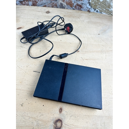 211 - PS2 Slim, no controllers no AV Cable