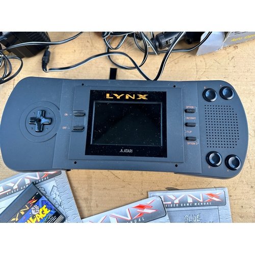 219 - Atari Lynx Handheld Console with Games & Accessories