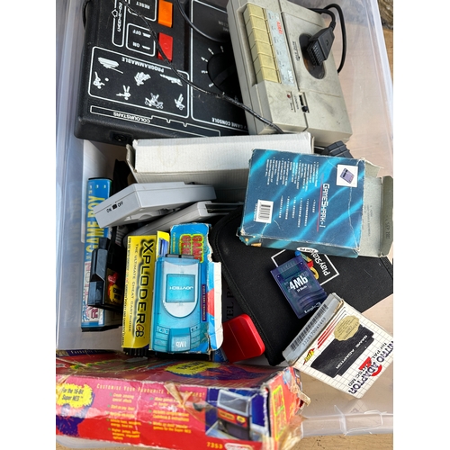 235 - Mixed Vintage Gaming Accessories & Cheat Cartridges etc