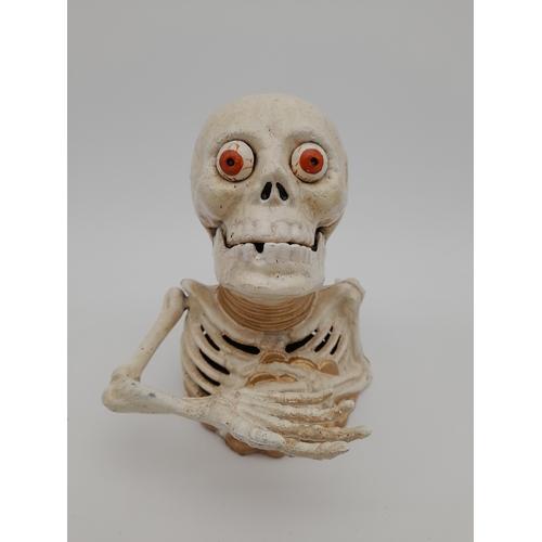 479 - Mechanical Cast Iron Skeleton Money Bank - 17cm tall