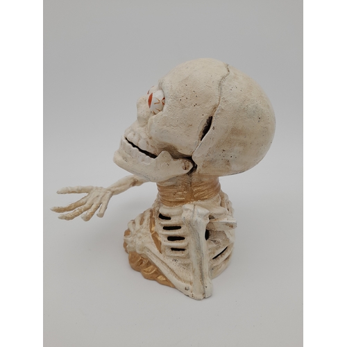 479 - Mechanical Cast Iron Skeleton Money Bank - 17cm tall