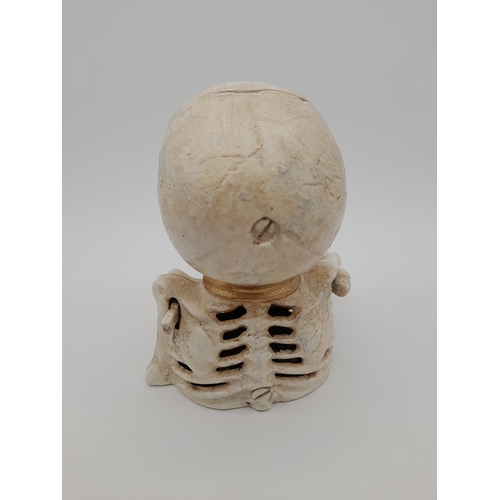 479 - Mechanical Cast Iron Skeleton Money Bank - 17cm tall