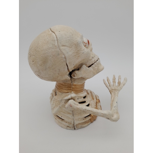 479 - Mechanical Cast Iron Skeleton Money Bank - 17cm tall