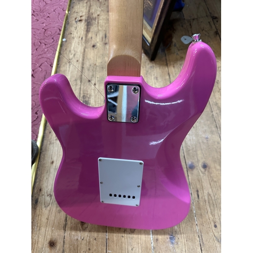 586 - Shocking Pink Stratocaster Style Electric Guitar by Rockburn