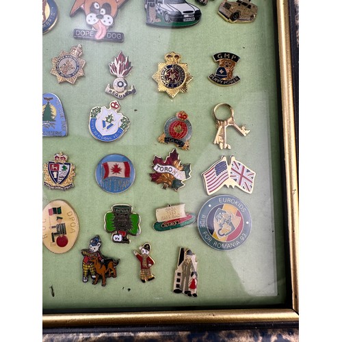 175 - Framed Display of Police/Law Enforcement Themed Enamel Badges (42)