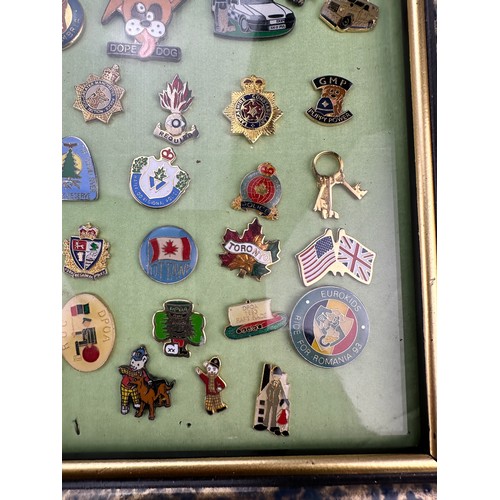 175 - Framed Display of Police/Law Enforcement Themed Enamel Badges (42)