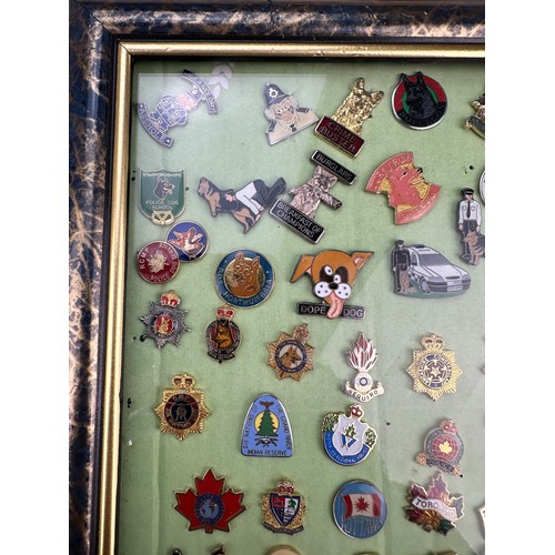 175 - Framed Display of Police/Law Enforcement Themed Enamel Badges (42)