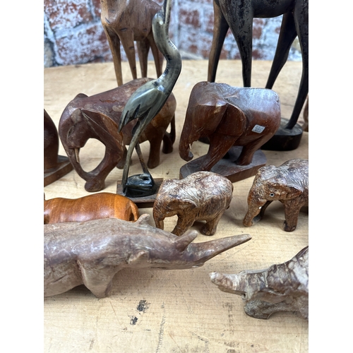 333 - Large Group of Carved Wooden Animals