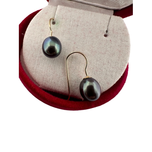 65 - Fourteen Carat Gold & Black Pearl Earrings 1.65g gross...