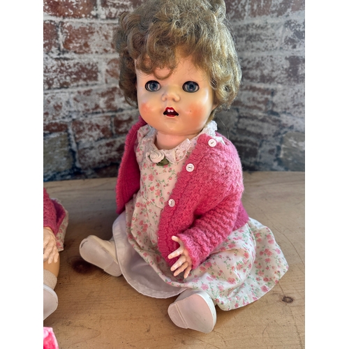 171 - Pair of Vintage Pedigree Crying Dolls with spare clothes