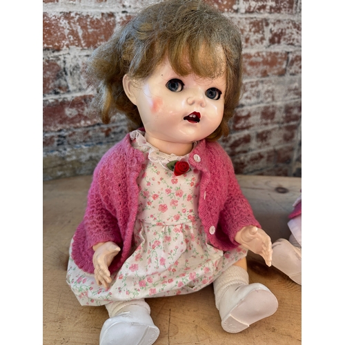 171 - Pair of Vintage Pedigree Crying Dolls with spare clothes