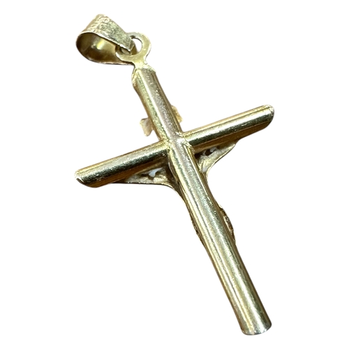 12 - Nine Carat Gold Crucifix Pendan. Stamped 9Kt Italy, 0.7g