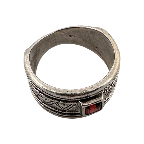 18 - Silver andGarnet Ring. Stamped 925, size P. 7g...