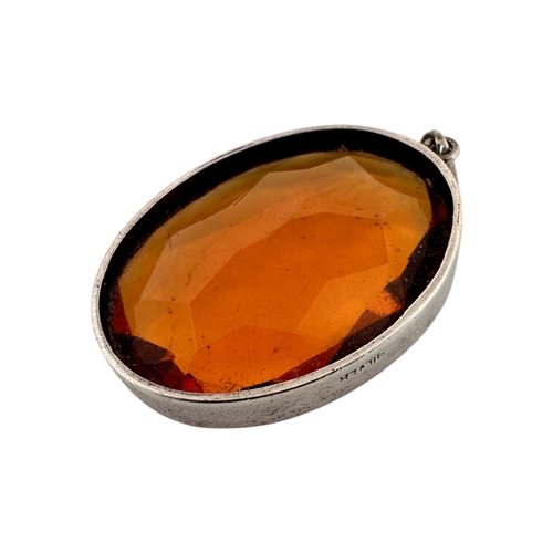 41 - Large Faceted Citrine Pendant in Mount marked Silver. Gross Weight 10.8g