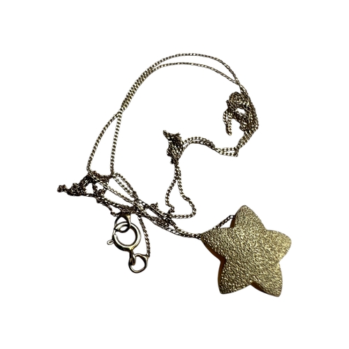 61 - NIne Carat Gold Star Pendant Necklace on 18