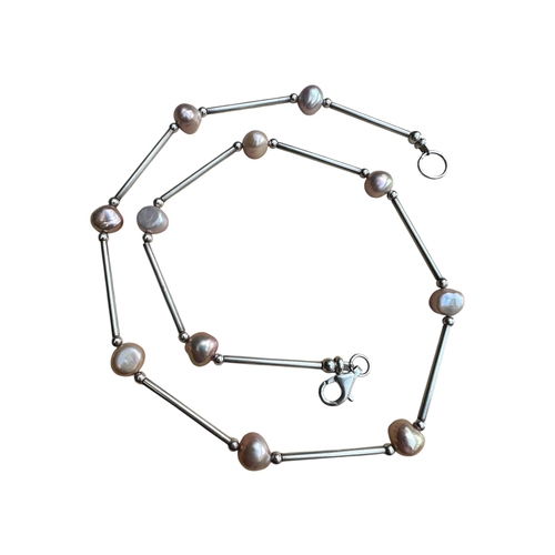 76 - Silver and Pearl Necklace. Stamped 925. Length 19