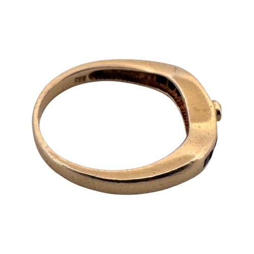 95 - Fourteen Carat Gold Ring set with Black Stones. Size S. 4.08g