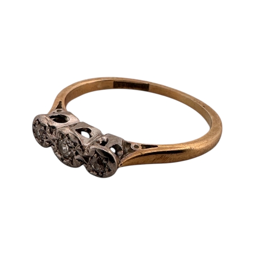 101 - Eighteen Carat Gold and Platinum Ring set with Three Diamonds. SizeM. 2.05g