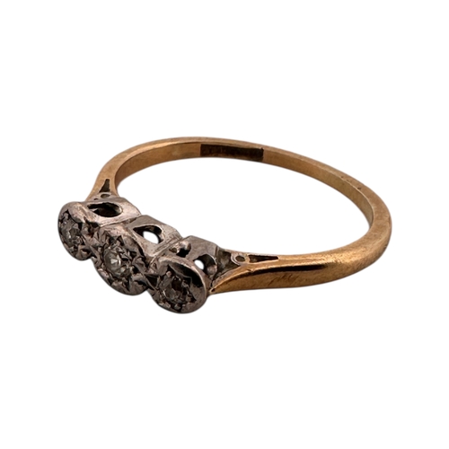 101 - Eighteen Carat Gold and Platinum Ring set with Three Diamonds. SizeM. 2.05g