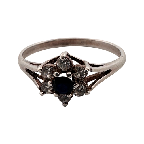 102 - Silver Ring set with Small White Stones & One Black. Size P