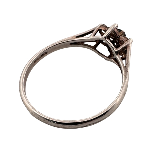 102 - Silver Ring set with Small White Stones & One Black. Size P