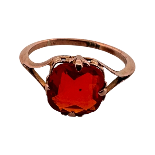 111 - Niner Carat Rose Gold Ring set with Orange Stone. Size I. 1.21g