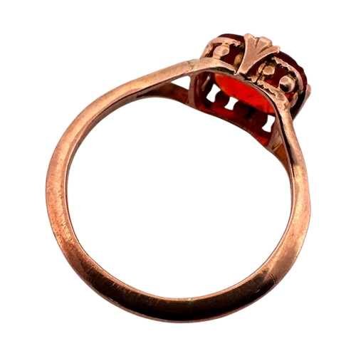 111 - Niner Carat Rose Gold Ring set with Orange Stone. Size I. 1.21g