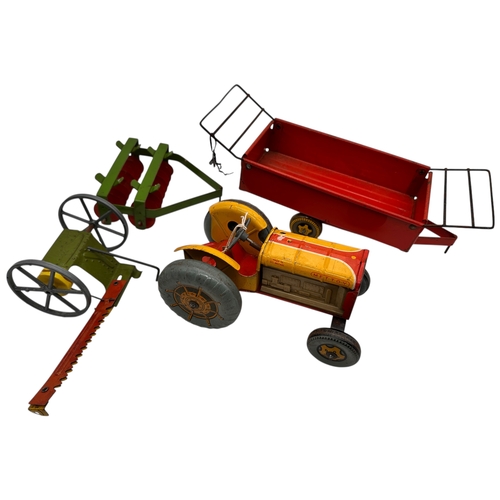 215 - Mettoy Tinplate Clockwork Tractor Toy with Accessories - working