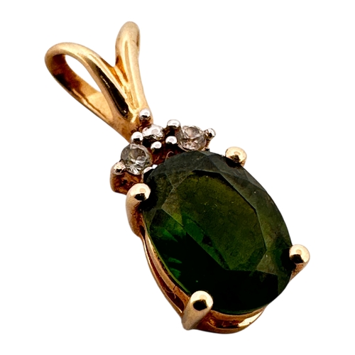 61 - Ten Carat Gold Pendant with Emerald Green Coloured Stone by TGGC. 1.02g