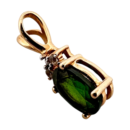 61 - Ten Carat Gold Pendant with Emerald Green Coloured Stone by TGGC. 1.02g