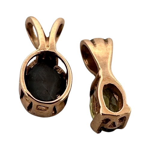 62 - Two Small Yellow Metal & Gemstone Pendants. 0.96g