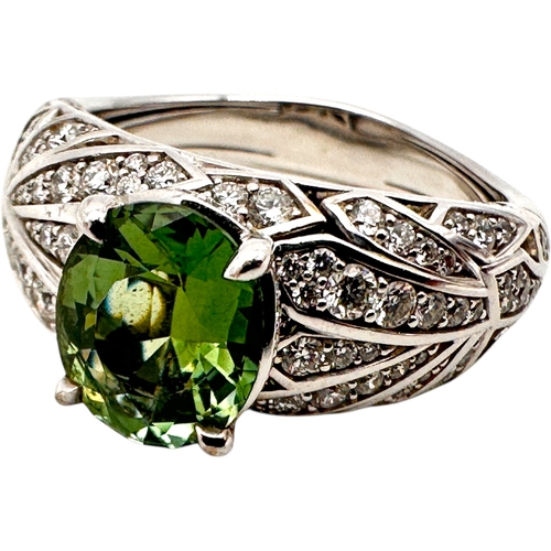 133 - Kat Florence - 2.24 ct Unheated Paraiba Tourmaline - Green Ring. Set in Eighteen Carat Gold with 158... 