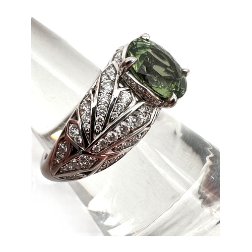 133 - Kat Florence - 2.24 ct Unheated Paraiba Tourmaline - Green Ring. Set in Eighteen Carat Gold with 158... 
