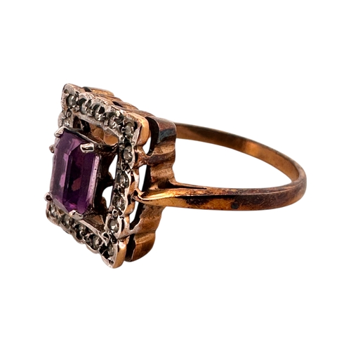 119 - Nine Carat Gold Ring set with Amethyst Surrounded by Diamonds. Size P. 2.8g