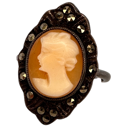 131 - Silver and Marcasite Cameo Ring, size L. Rubbed Marks.