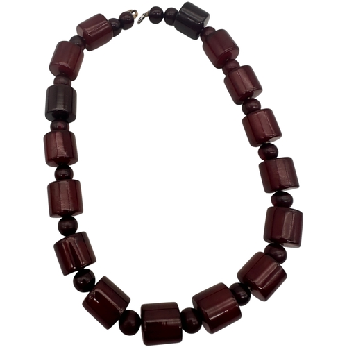 1 - Cherry Amber Bakelite Beads. 58g. 16