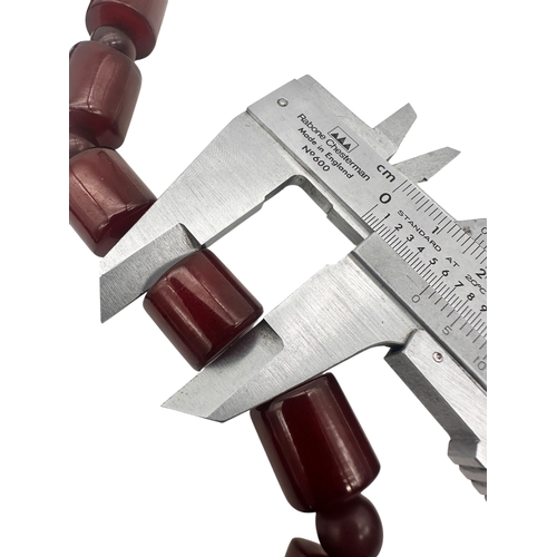 1 - Cherry Amber Bakelite Beads. 58g. 16