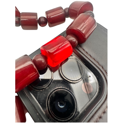 1 - Cherry Amber Bakelite Beads. 58g. 16
