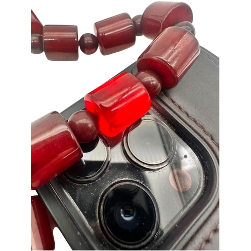 1 - Cherry Amber Bakelite Beads. 58g. 16