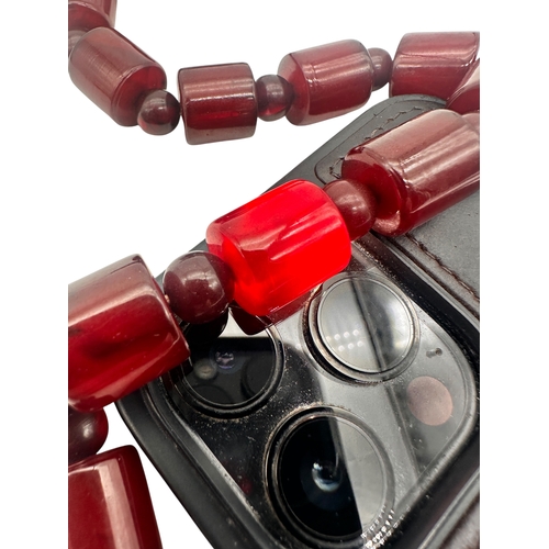 1 - Cherry Amber Bakelite Beads. 58g. 16