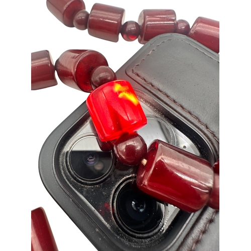 1 - Cherry Amber Bakelite Beads. 58g. 16