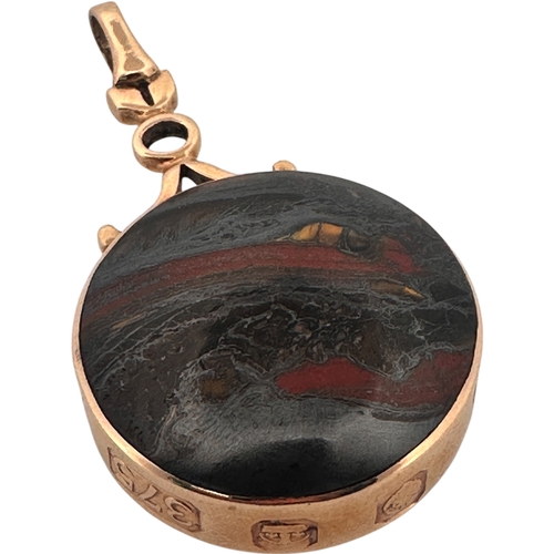 14 - Large Polished Stone Fob with Thick Hallmarked Gold Surround. 21.8g gross.