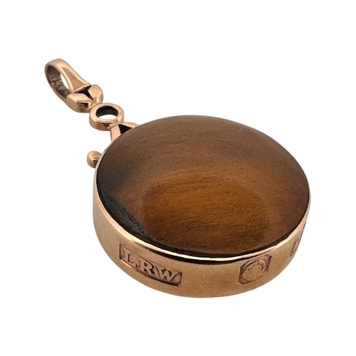 14 - Large Polished Stone Fob with Thick Hallmarked Gold Surround. 21.8g gross.