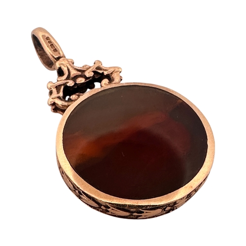 15 - Polished Stone Fob with Hallmarked Nine Carat Gold Surround. 9.32g gross