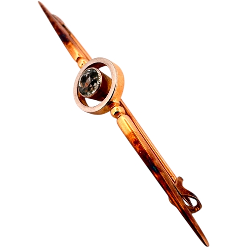 18 - Antique Fifteen Carat Gold Bar Brooch with White Stone. 2.85g