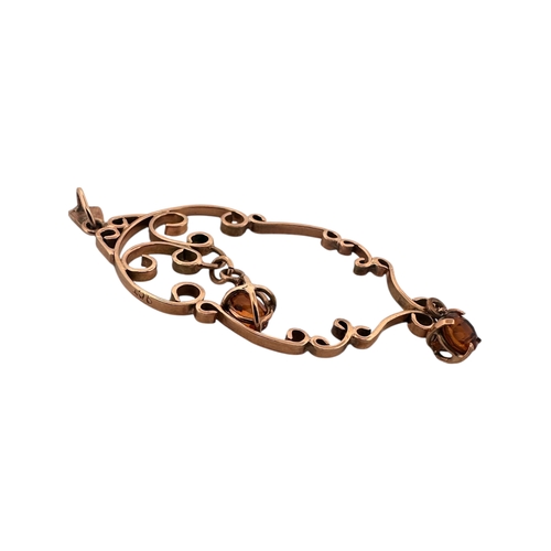 24 - Nine Carat Gold Pendant with Two Amber Coloured Stone Droppers. 2.92g